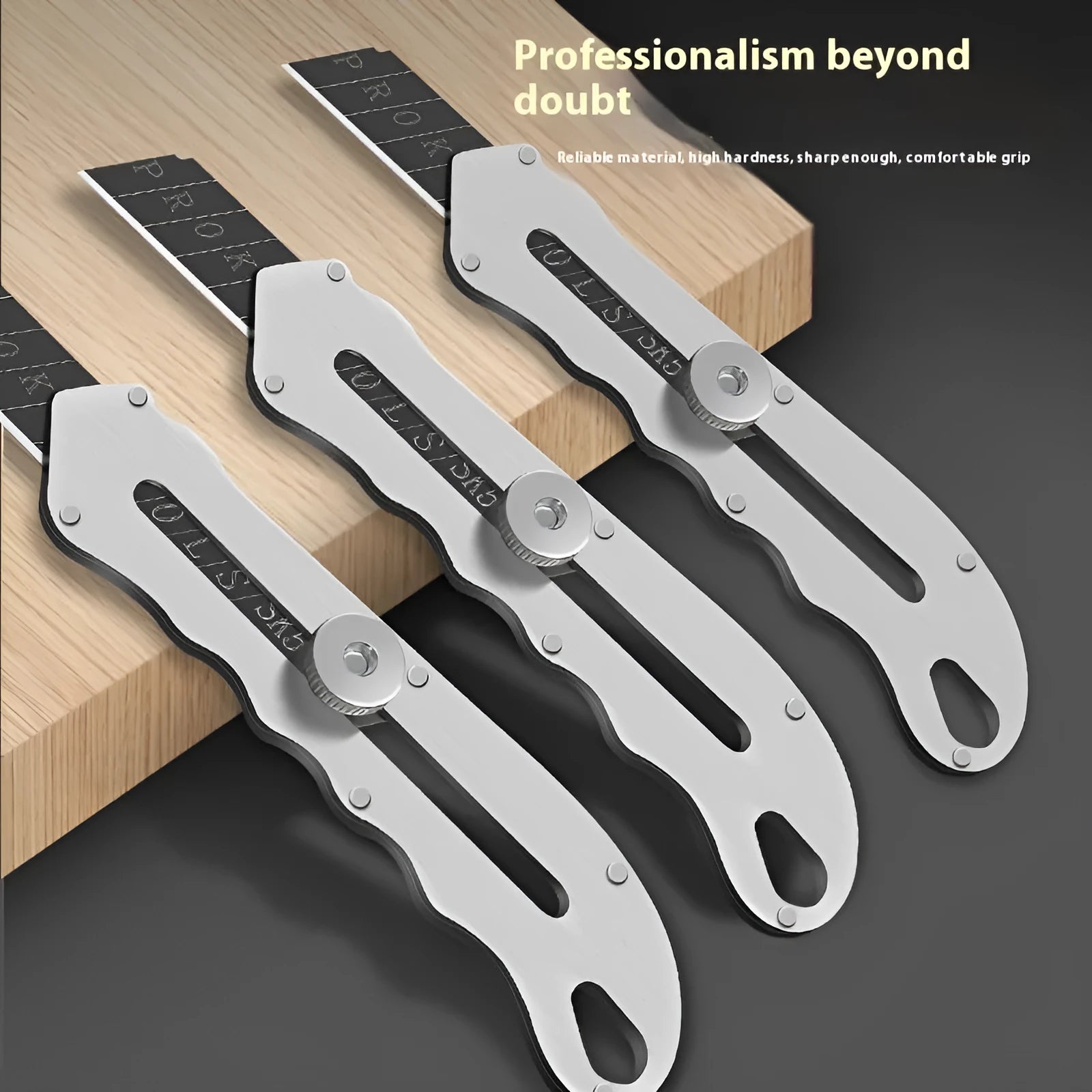 Stainless steel folding art knife with black blades including long and trapezoidal blade types