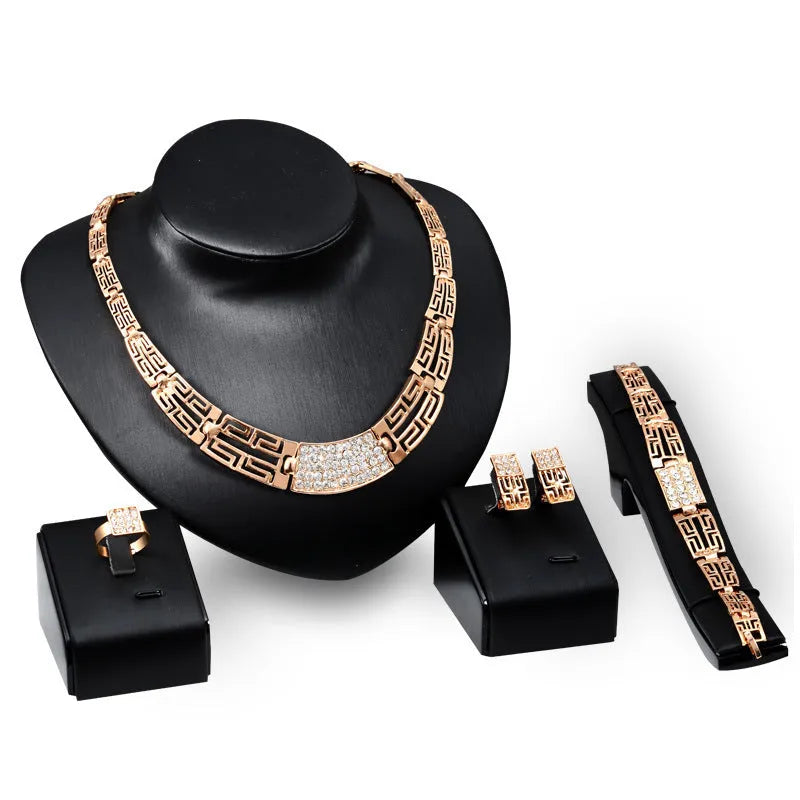 18K gold plated alloy women's jewelry set with star sun moon cloud universe motifs on diamond pattern surface