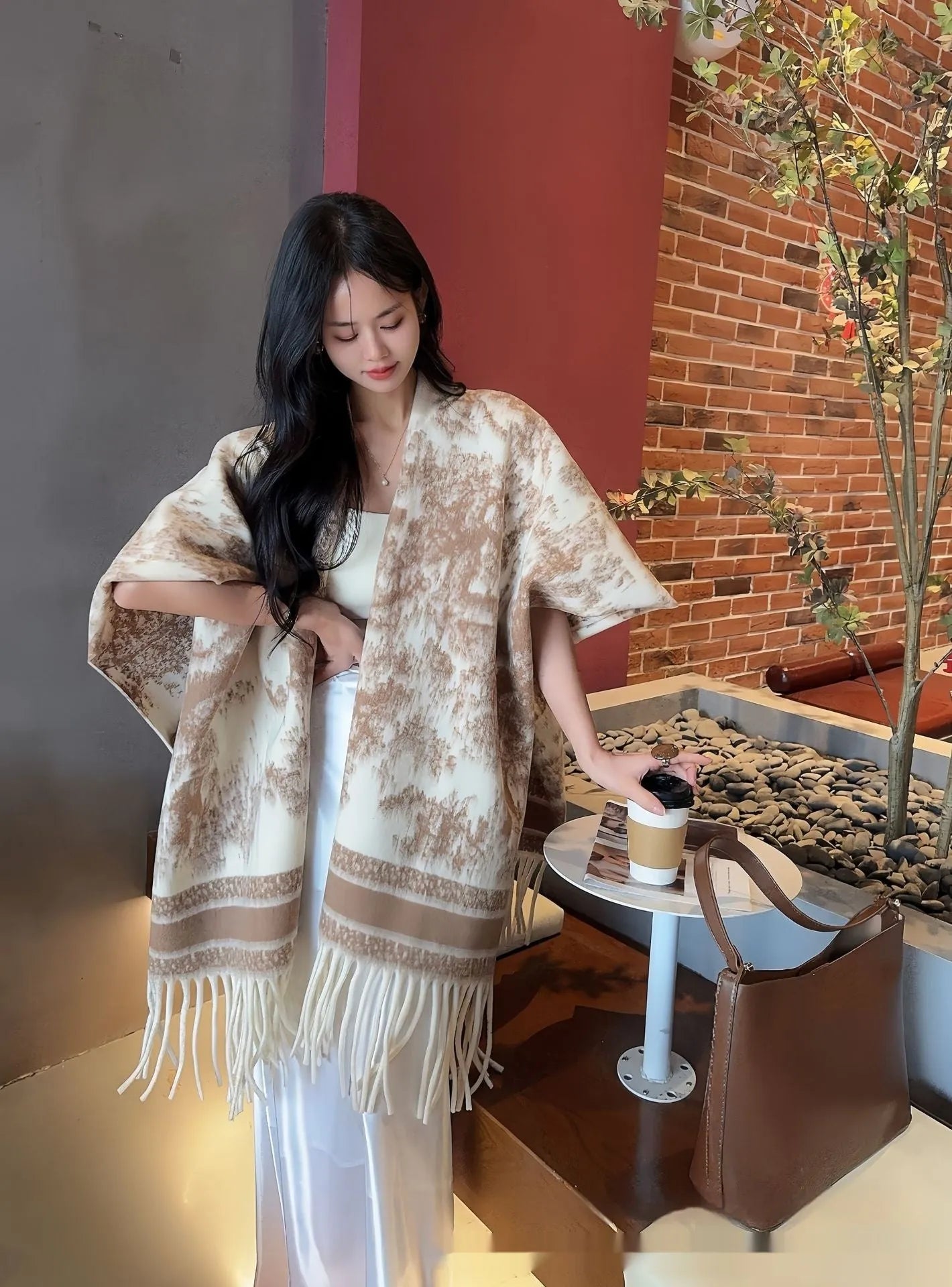 Women's casual polyester scarf cape in a shawl style, shown in one of five available colours.