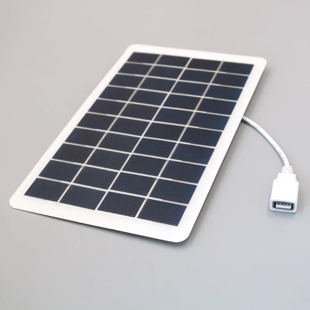 Black solar panel mobile phone charger with USB port and textured PET surface