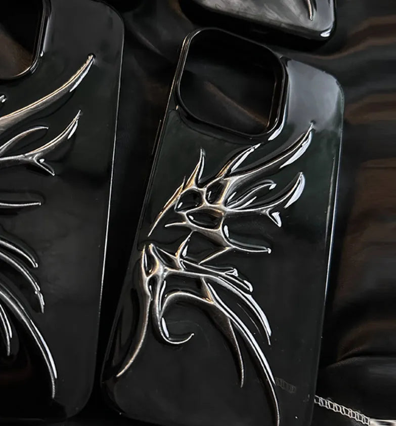 Black iPhone case with a blurred, three-dimensional wings design on the back.