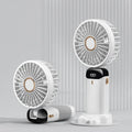 Blue portable handheld fan showing foldable design with digital battery display and removable grill