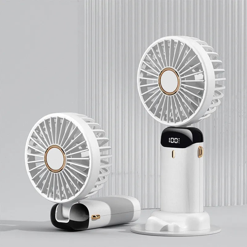 Blue portable handheld fan showing foldable design with digital battery display and removable grill
