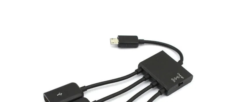 Black Micro USB OTG hub adapter with one-to-four ports and 0.25-metre cable