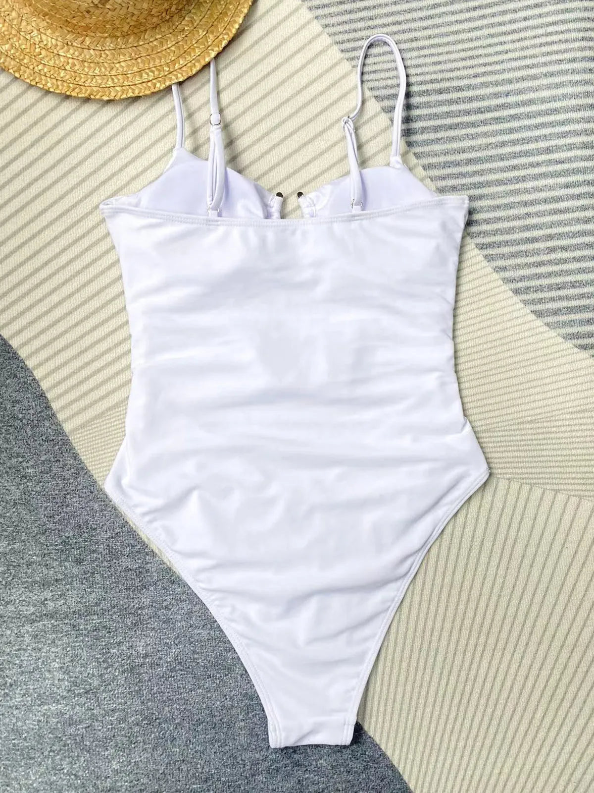 Black women's one-piece swimsuit on mannequin showing front design