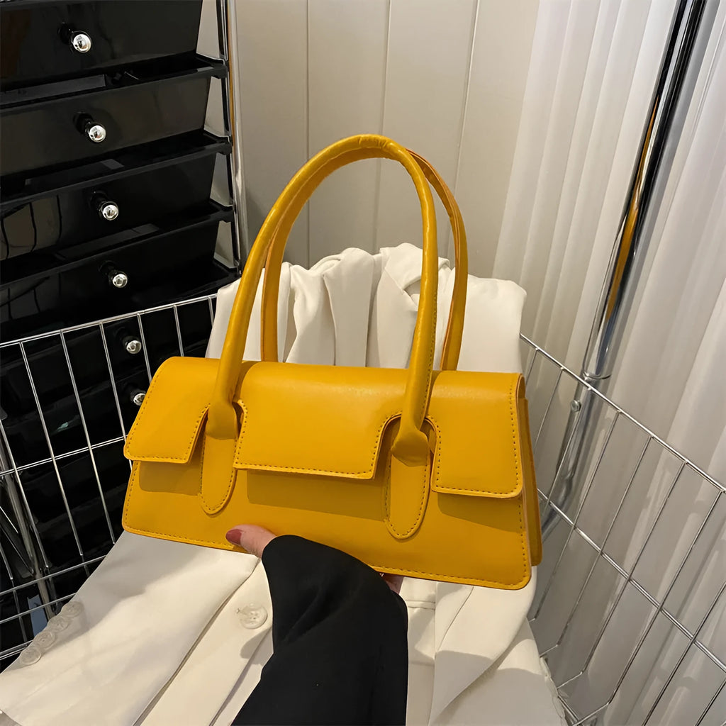 Women's small square shoulder bag in PU leather showing horizontal design with stitching details