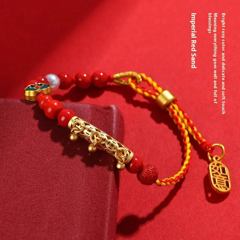 Women's red cinnabar hand-woven rope bell bracelet with geometry shapes and national style design