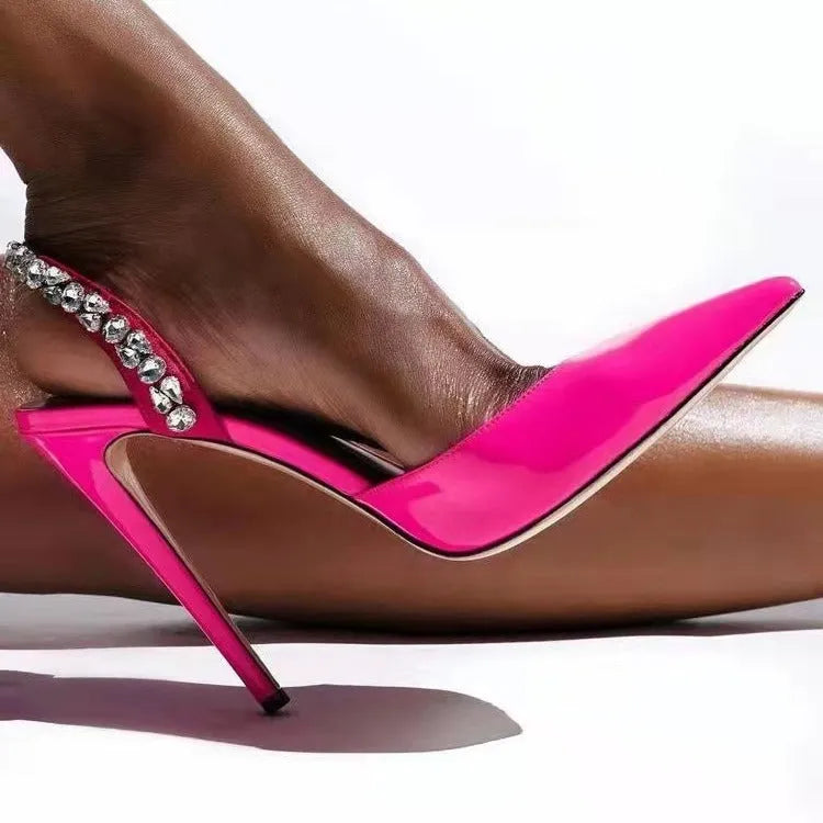 Women's black patent leather pointed toe high heel sandals with side rhinestone decoration.