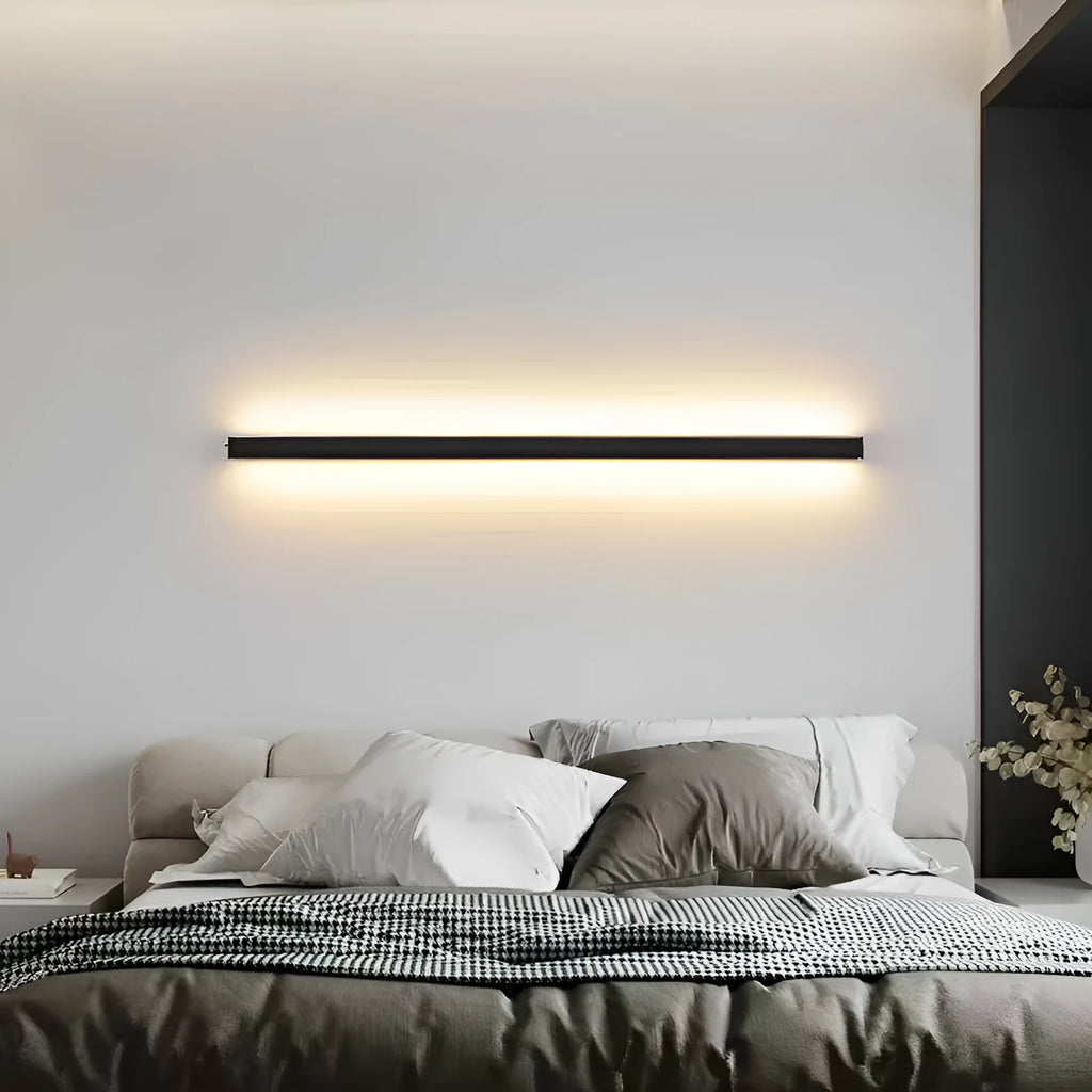 Black 80cm long simple strip LED wall lamp mounted on a plain wall.