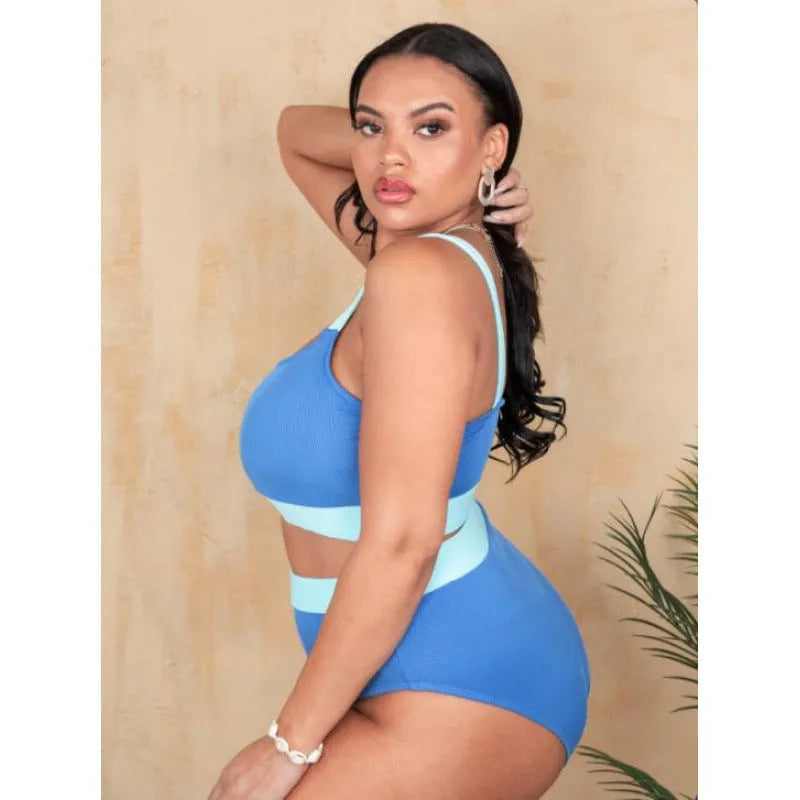 Women's solid colour high waist one-piece swimsuit with a split suit brief style.