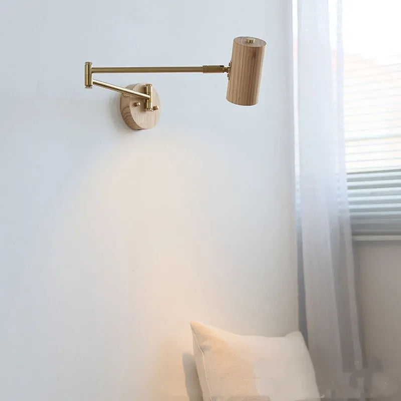 Retro wooden finish wall lamp with long rotating arm and integrated switch.
