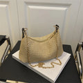 Woven straw crossbody handbag with horizontal square shape and phone compartment
