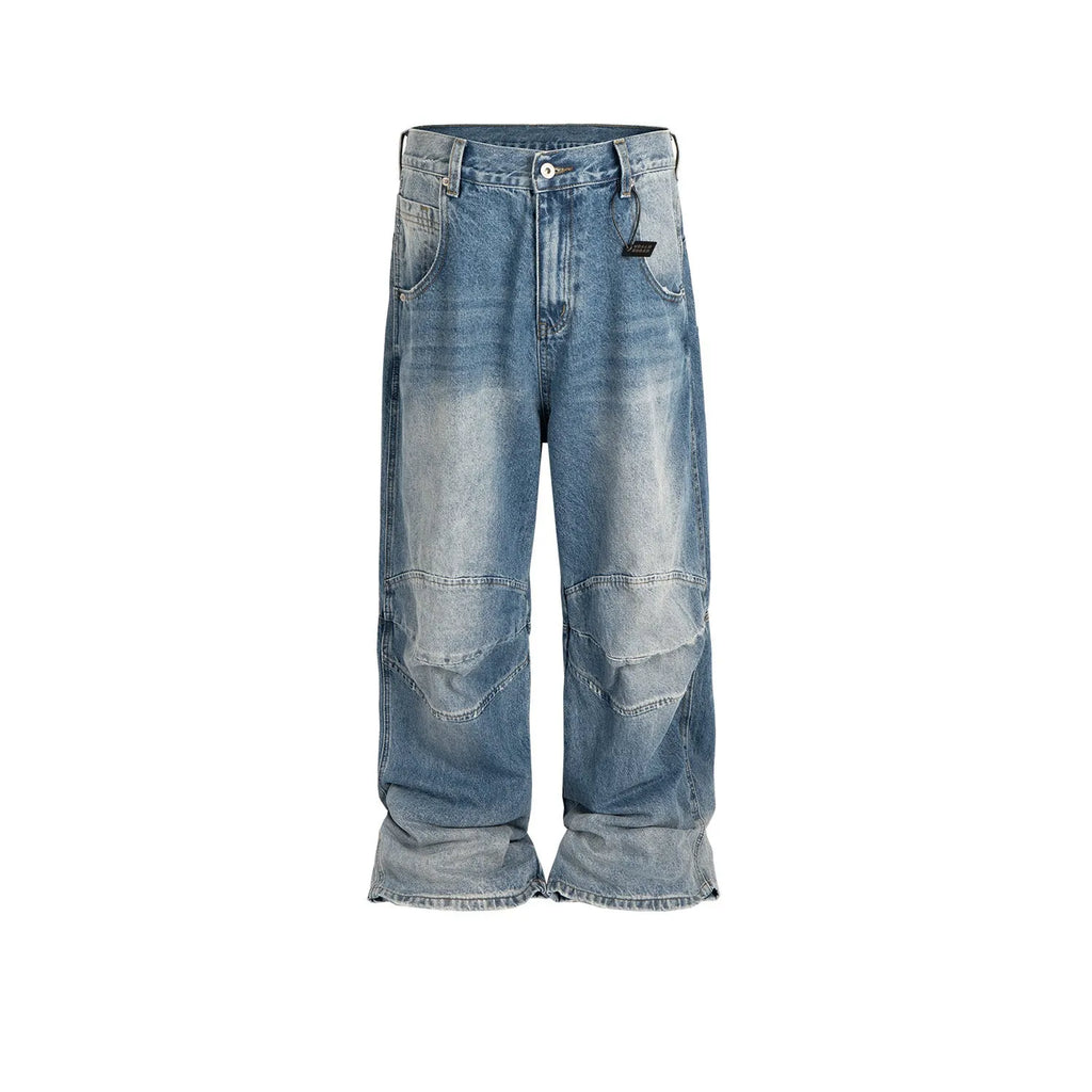 Men's washed blue baggy jeans with pleated front detail and straight-leg cut