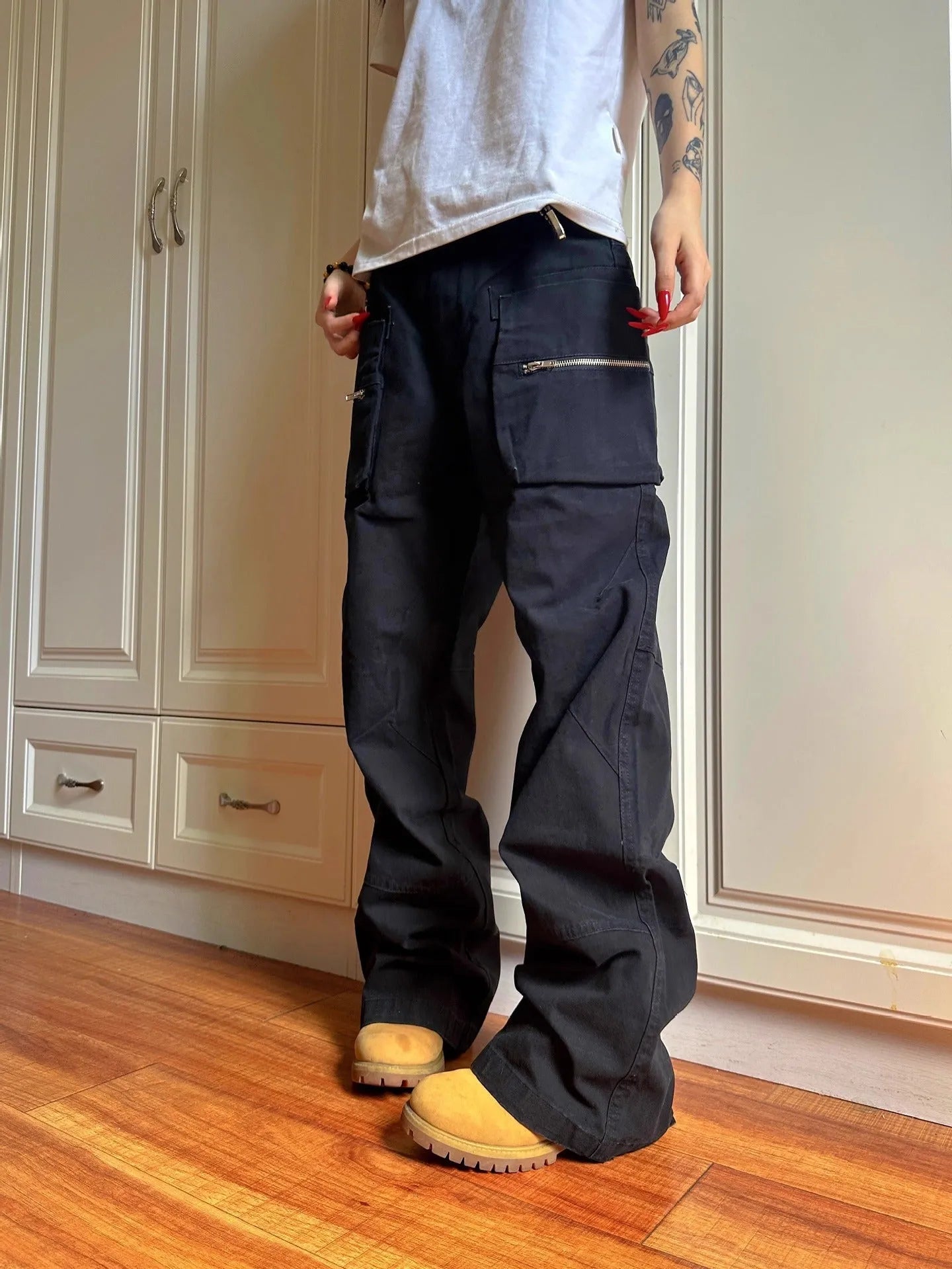 Green double zipper cotton workwear casual pants with a pocket, shown in mid-waist overalls style.