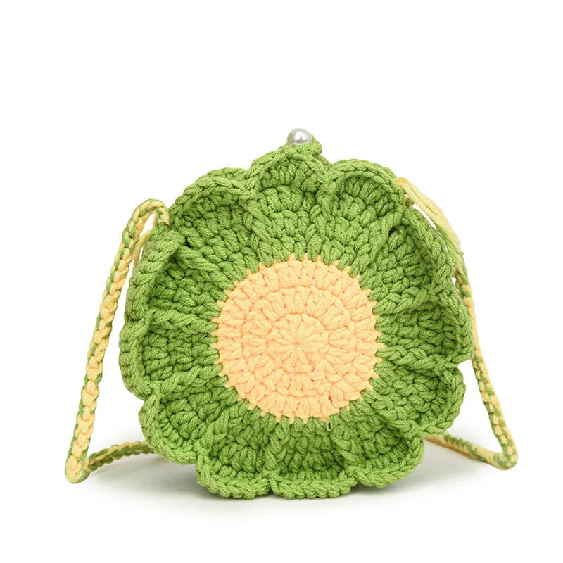Hand-woven crochet shoulder bag with wool flowers and round suitcase shape