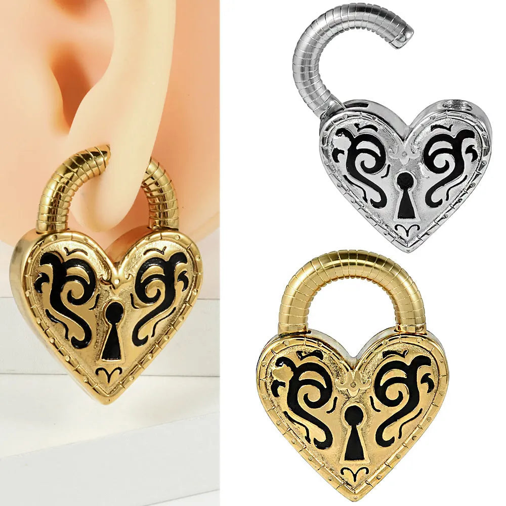 Heart-shaped stainless steel ear piercings in gold and steel colour options showing front and back views