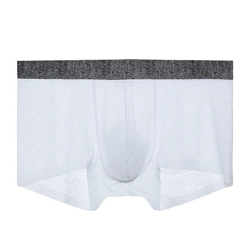 Men's seamless lace boxer briefs in a thin jacquard weave, shown in a solid colour with a low-waist design.