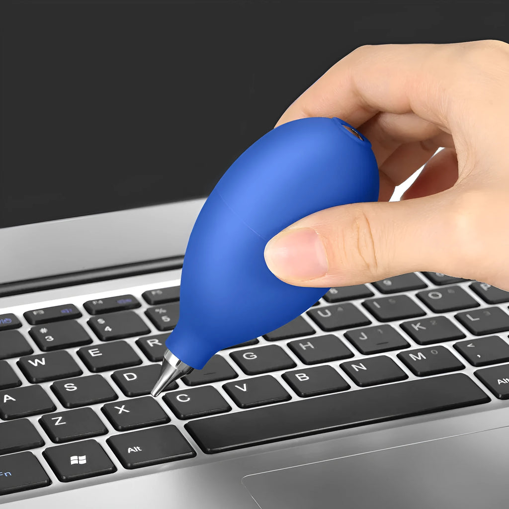 Blue handheld rubber dust blower cleaning tool for cameras and mobile phones.