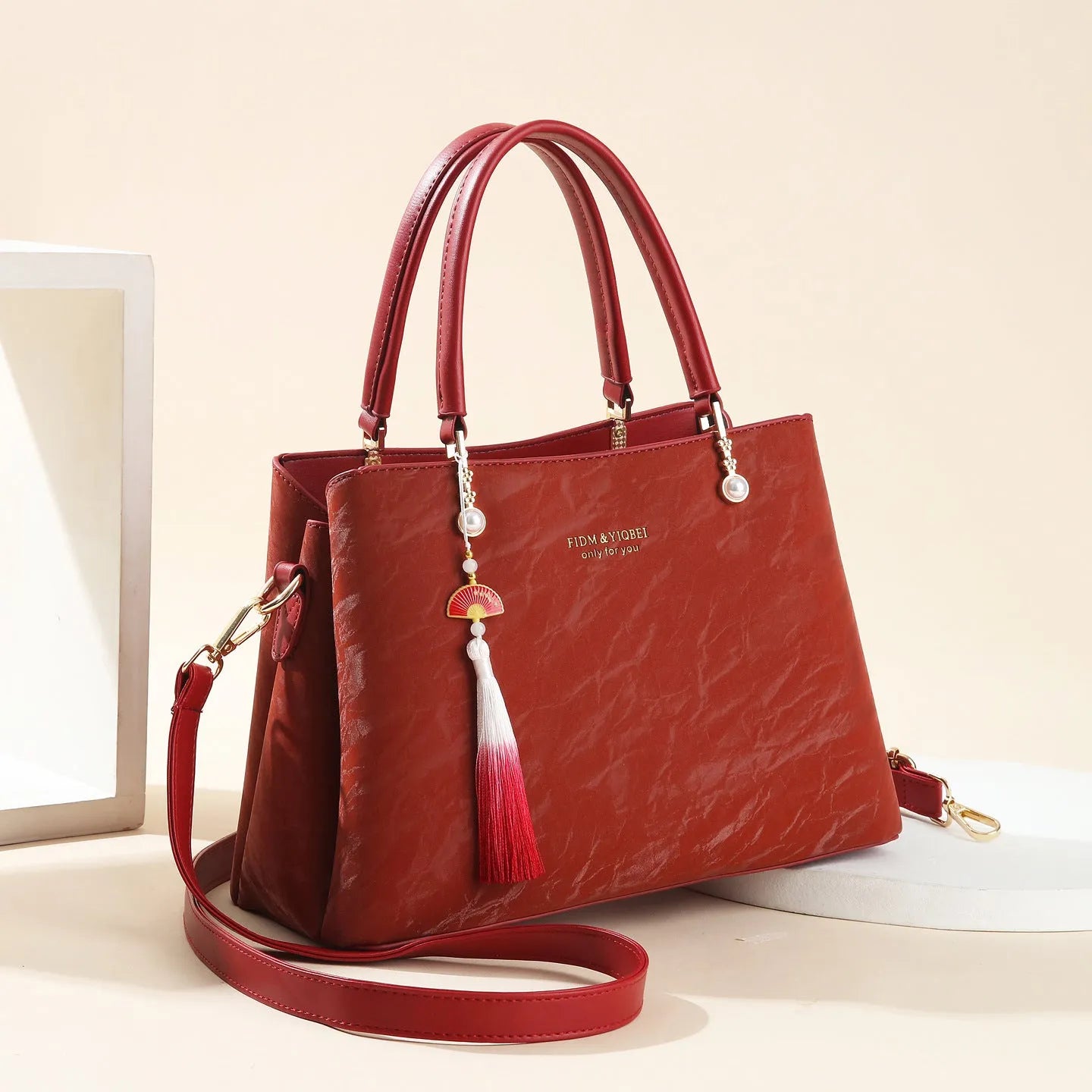 Women's large square shoulder bag in PU leather with a slit pocket, shown in beige colour.