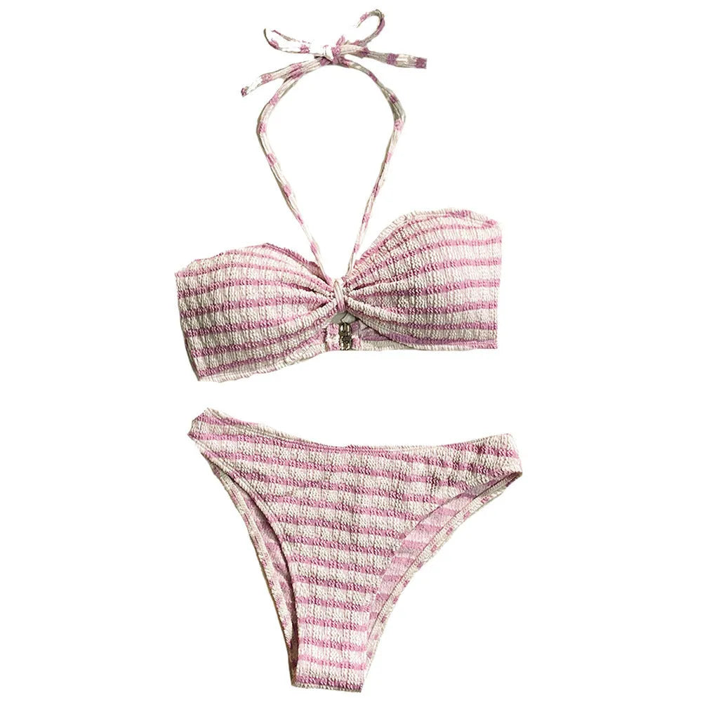 Women's pink and black striped bikini swimsuit with solid briefs.