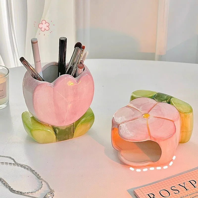 Ceramic pen holder box with floral pattern for desk organisation.