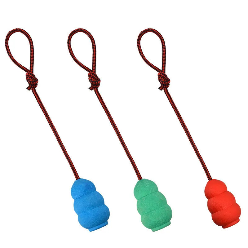 Rubber rope hoist pet toy with ball and rope in mixed colour hair, shown in 9cm small and 12cm large sizes