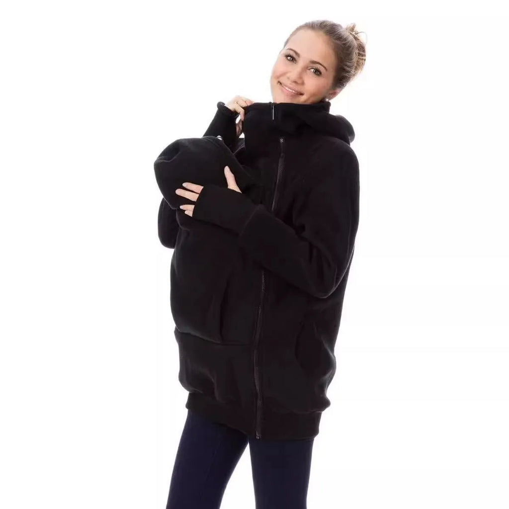 Red loose-fit polar fleece sweater for women with long sleeves, shown on a hanger.