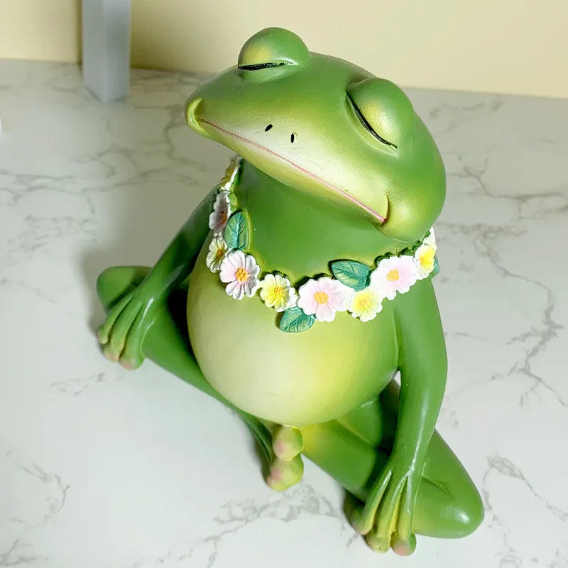 RDW123 coloured magic yoga frog resin and plastic ornament on a surface.