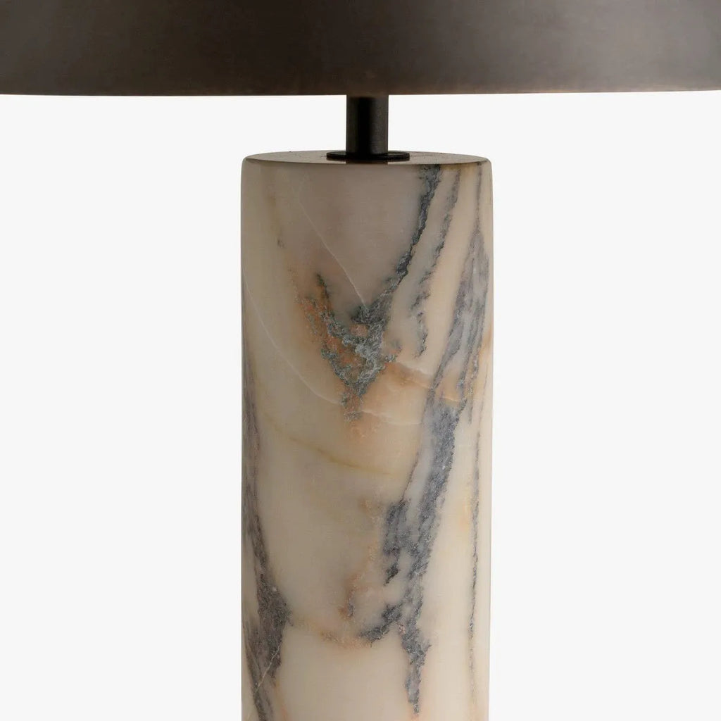 Black modern minimalist table lamp with a solid marble base on a wooden surface.