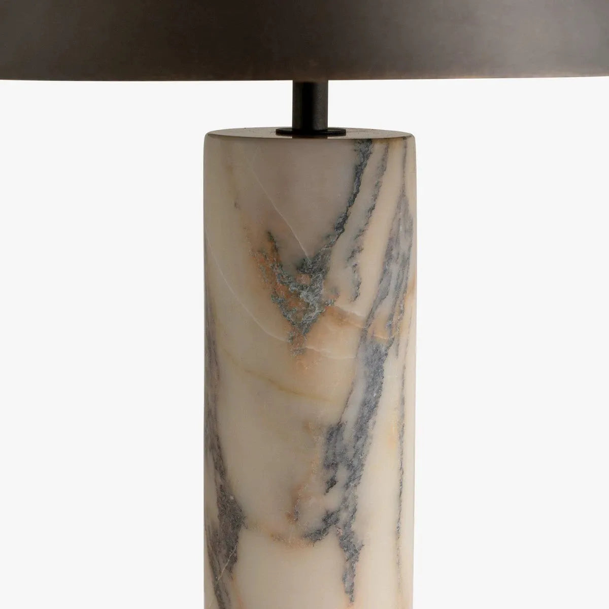 Black modern minimalist table lamp with a solid marble base on a wooden surface.