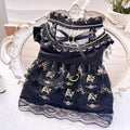 Golden layered gothic-style skirt for a small dog or cat on a mannequin, showing princess cut.