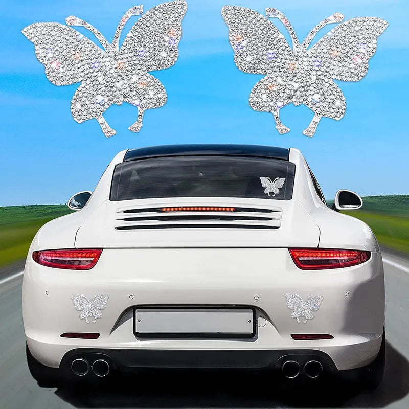 Glass diamond-encrusted car sticker in bear paw or butterfly design, measuring 7cm by 6cm.