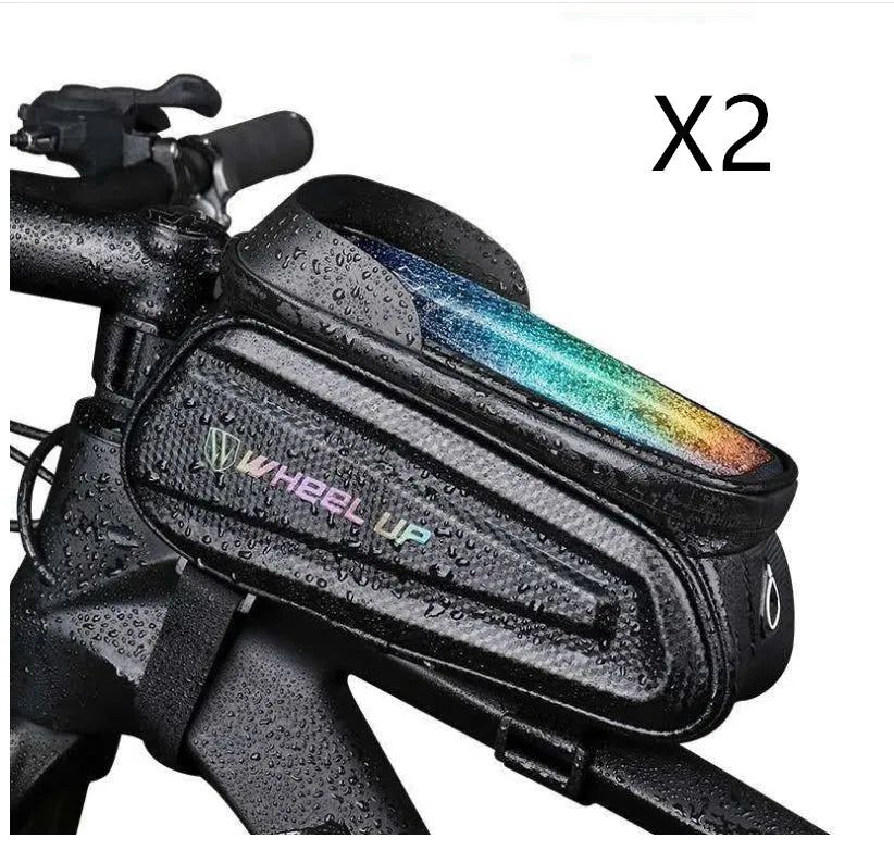 Black and grey mountain bike frame bag with reflective strips mounted on bicycle, showing touch-screen phone panel and adjustable straps