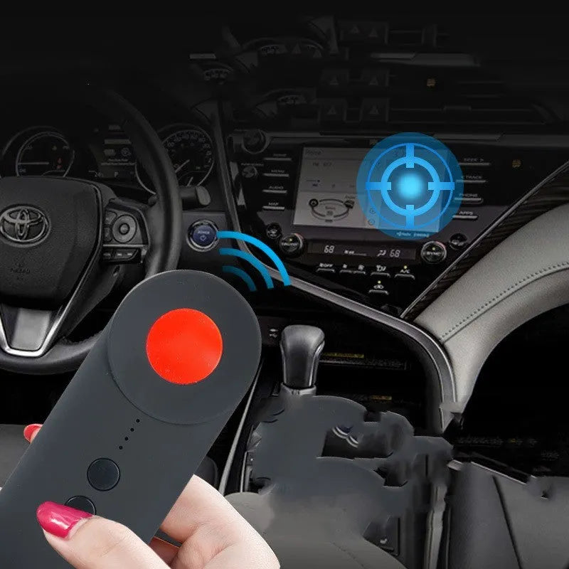 Black ABS handheld GPS and camera lens detector with a USB charging port.