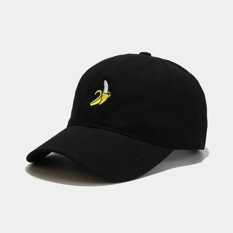 Cute banana fruit embroidered soft top baseball cap on adjustable strap, shown in peacock blue colour.