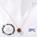 A natural stone beaded bracelet and necklace set laid out flat, showing matching bead styles.