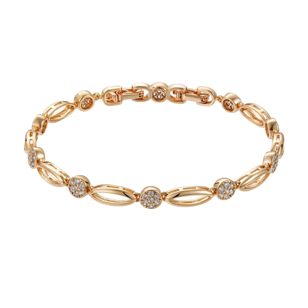 Golden coloured hollow carved copper bracelet with a U-shaped bangle profile on a white background.