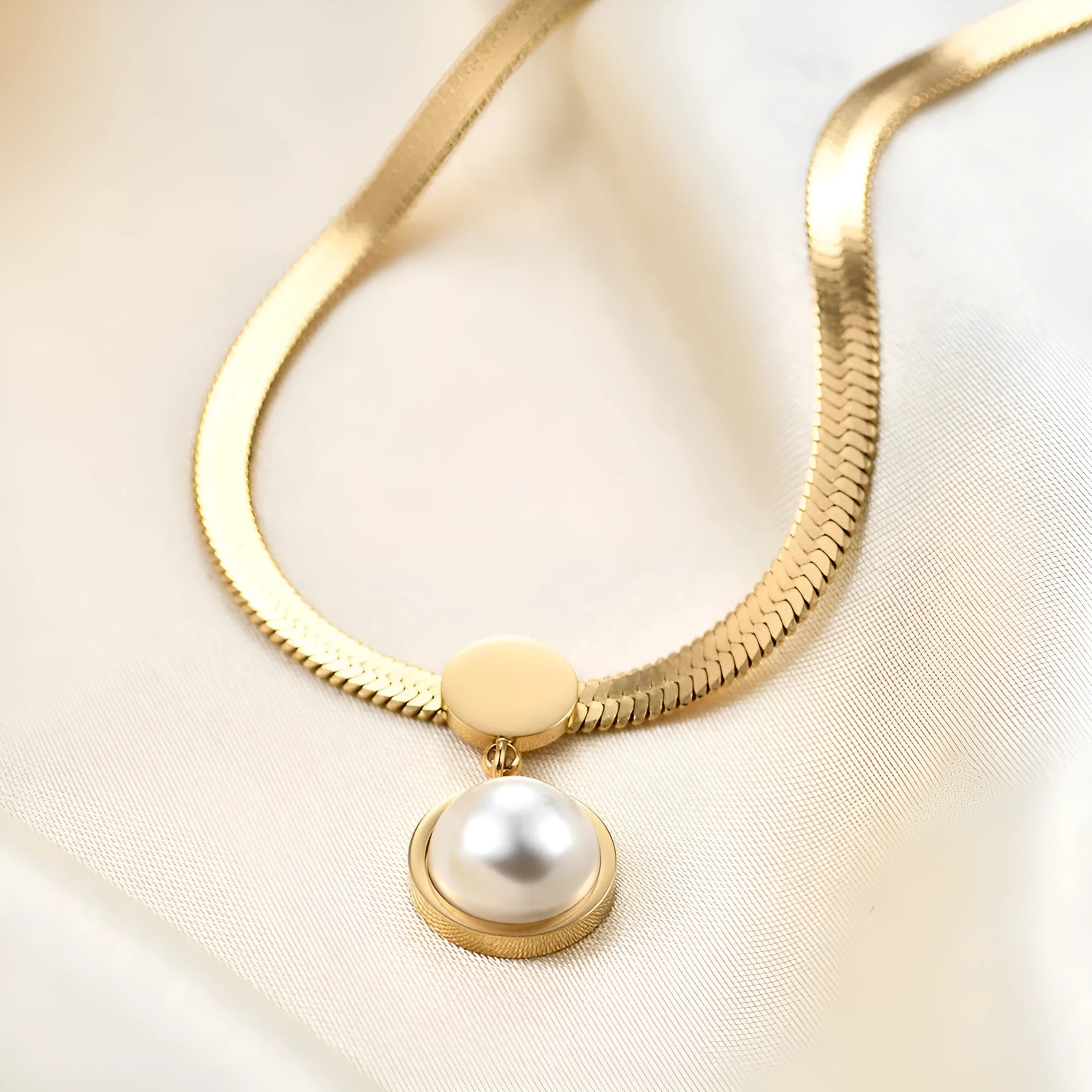 8mm titanium steel flat snake blade necklace in gold colour on a white background