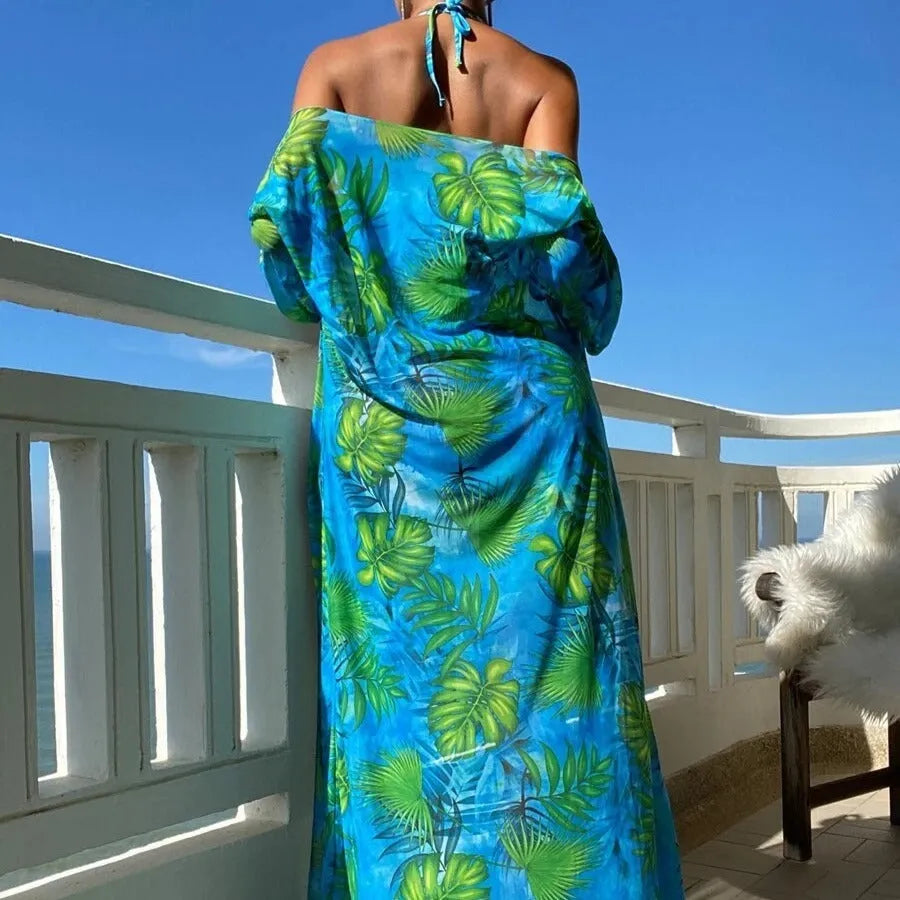 Women's long sleeve bikini swimsuit set with banded briefs and a matching robe in blue.