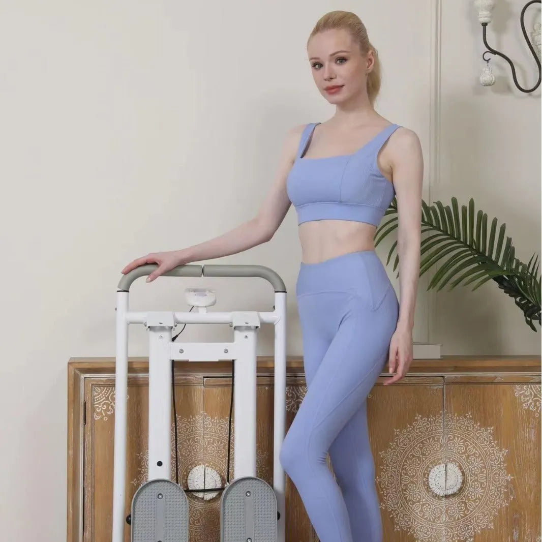 White foldable indoor climbing machine with integrated treadmill for home fitness