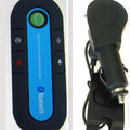 Black vehicle Bluetooth handsfree unit mounted on car sun visor with cable connection