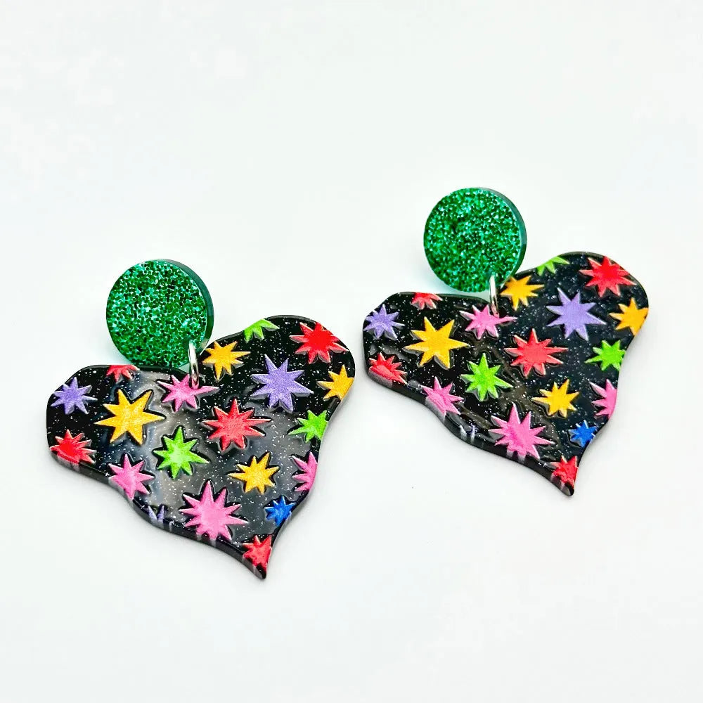 Color printing love heart acrylic earrings in six sweet styles A-F on white background