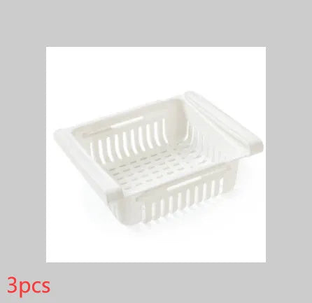 Blue telescopic plastic storage basket for refrigerator organisation with fruits and vegetables inside.