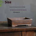 Rectangular unglazed purple sand bonsai pot showing simple design and base with five drainage lines.