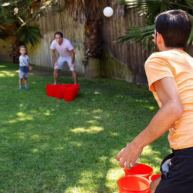 Red plastic beach bucket outdoor game set for beach throwing play