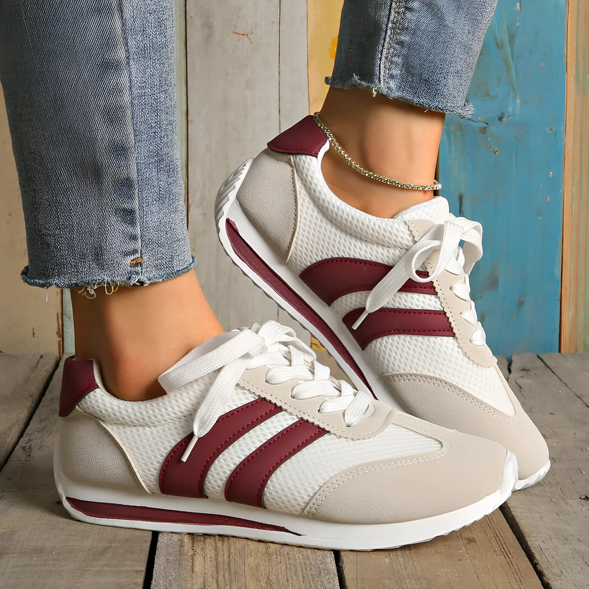 Wine red Cortez Retro sneakers with cross strap design and mesh lining