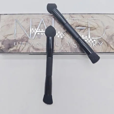 Double-headed miter sponge concealer brush with black artificial fibre bristles on wooden handle