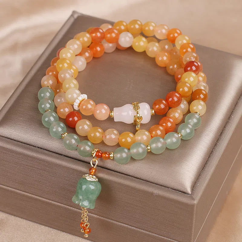 Multi-layer Jinsi Jade beaded bracelet with three circles and lily motif, ethnic style women's jewellery