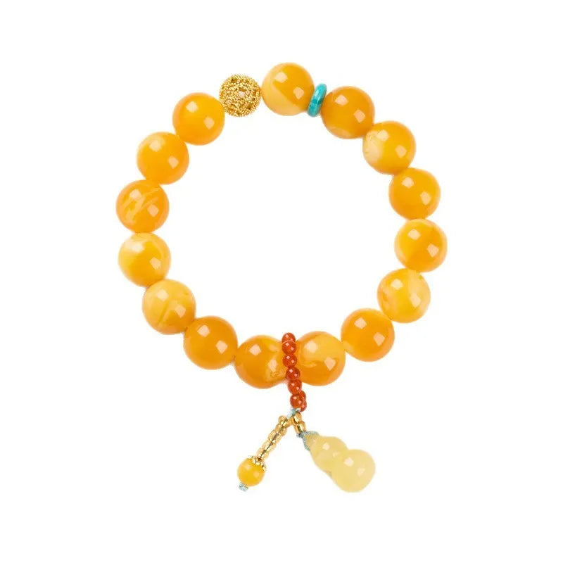 Natural beeswax Gourd Fu Lu bracelet in two sizes 12mm and 6mm on plain background