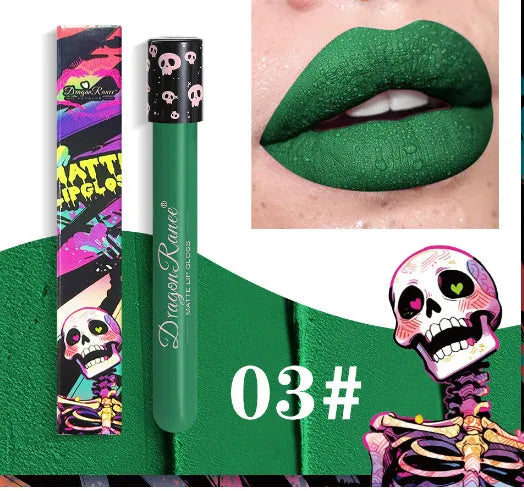 Halloween matte lip gloss in a test tube skull container showing gold and silver shades